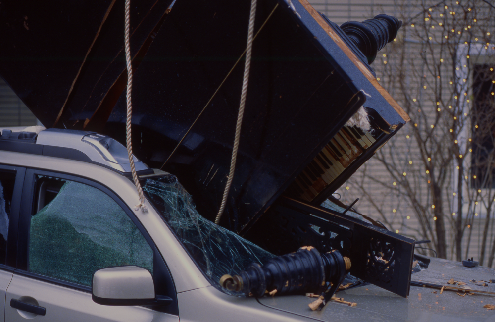 Piano falls on car in florida and causes personal injury