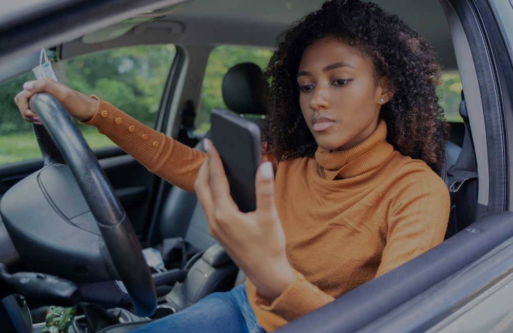 South florida driver paying attention to phone while driving